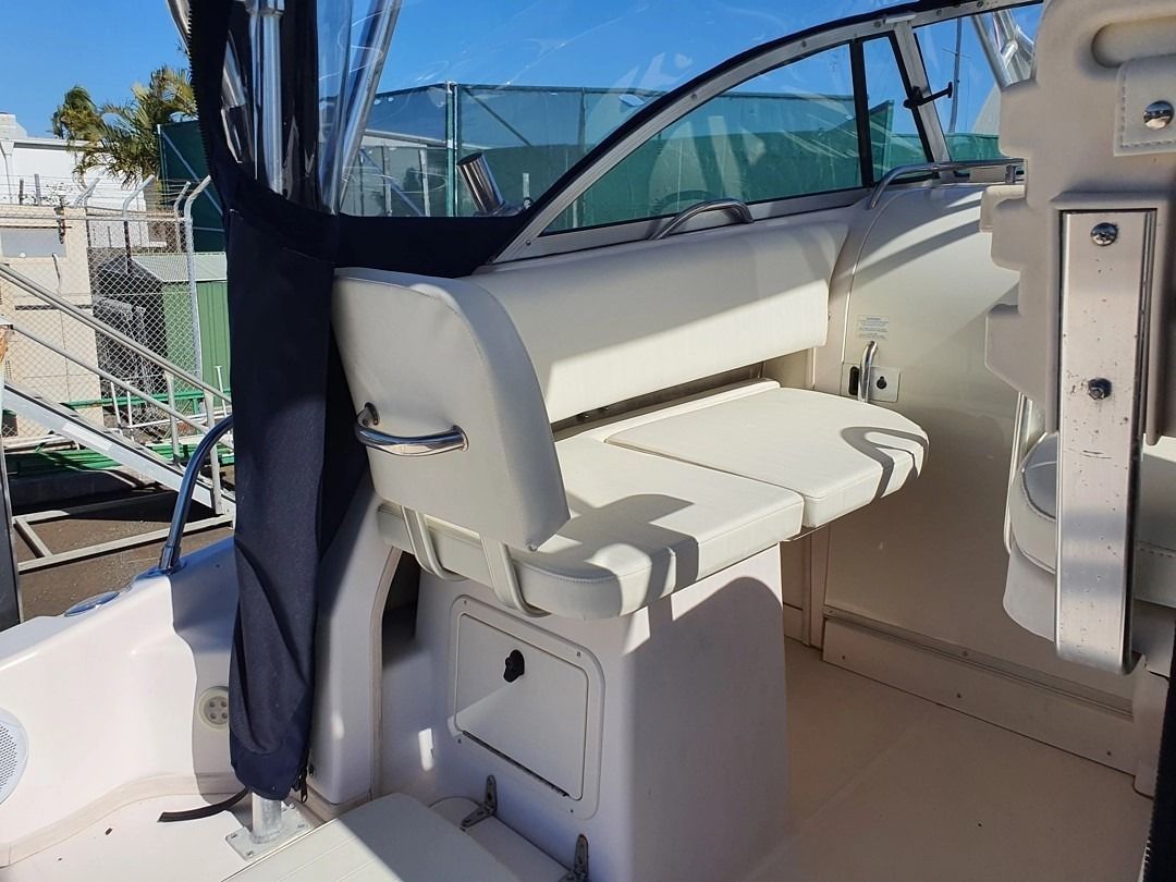 Boat Interior With White Cushioned Seats and Storage Compartment — The Boat Cover Company In Buddina, QLD