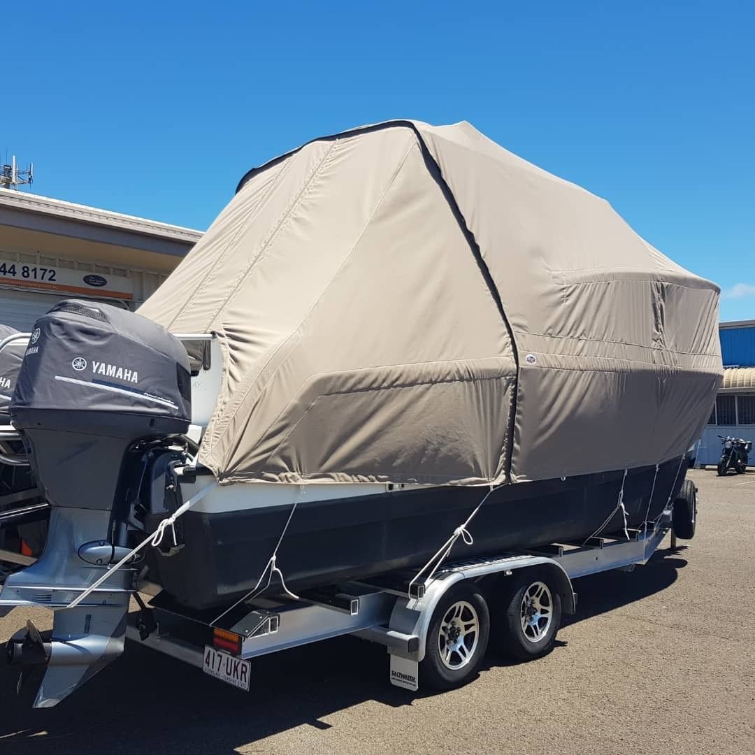 Boat on a Trailer With a Tan-colored Cover — The Boat Cover Company In Buddina, QLD