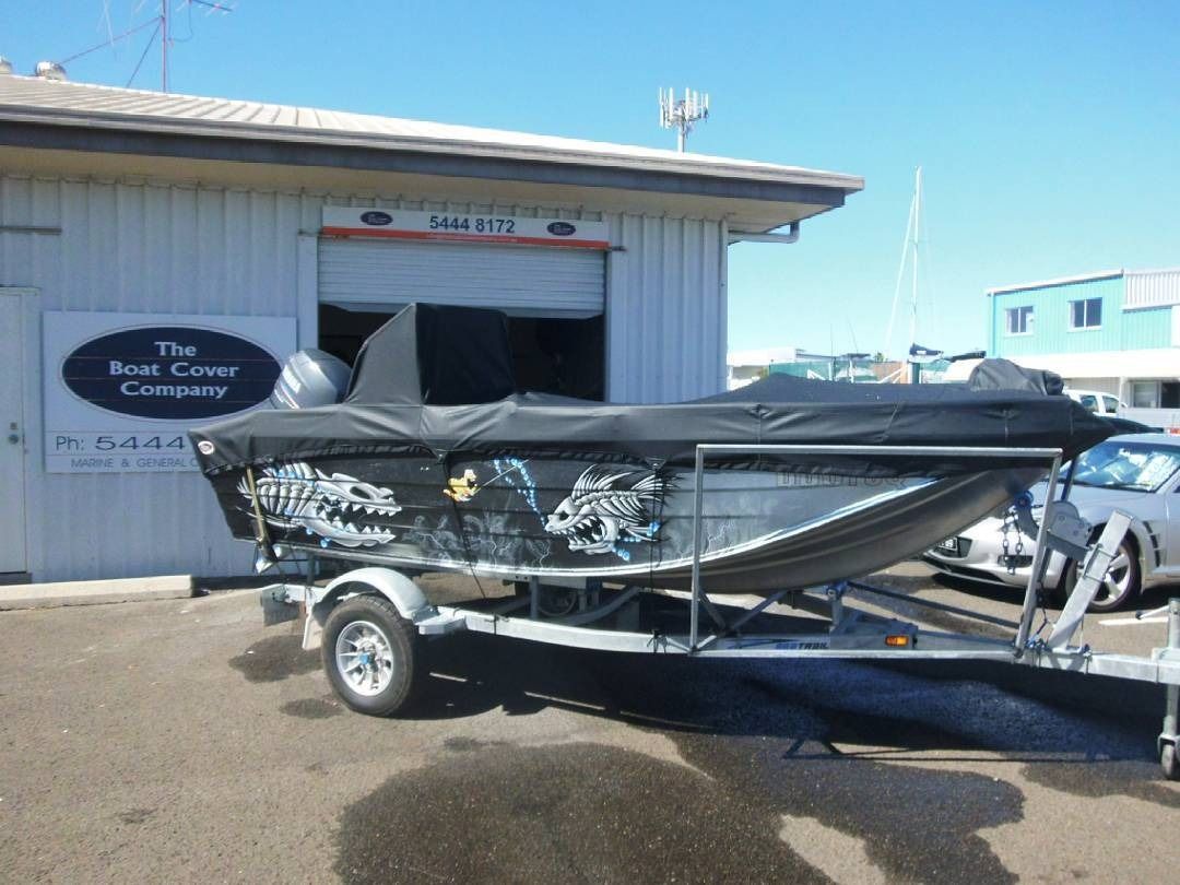 Aluminum Boat on a Trailer, Covered With a Black Tarp — The Boat Cover Company In Buddina, QLD