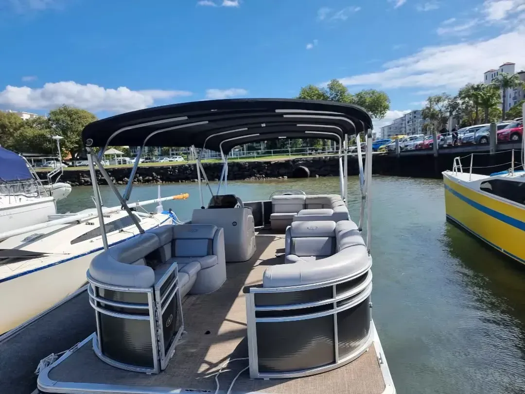 Pontoon Boat Docked in a Marina, Blue Sky Overhead — The Boat Cover Company In Buddina, QLD