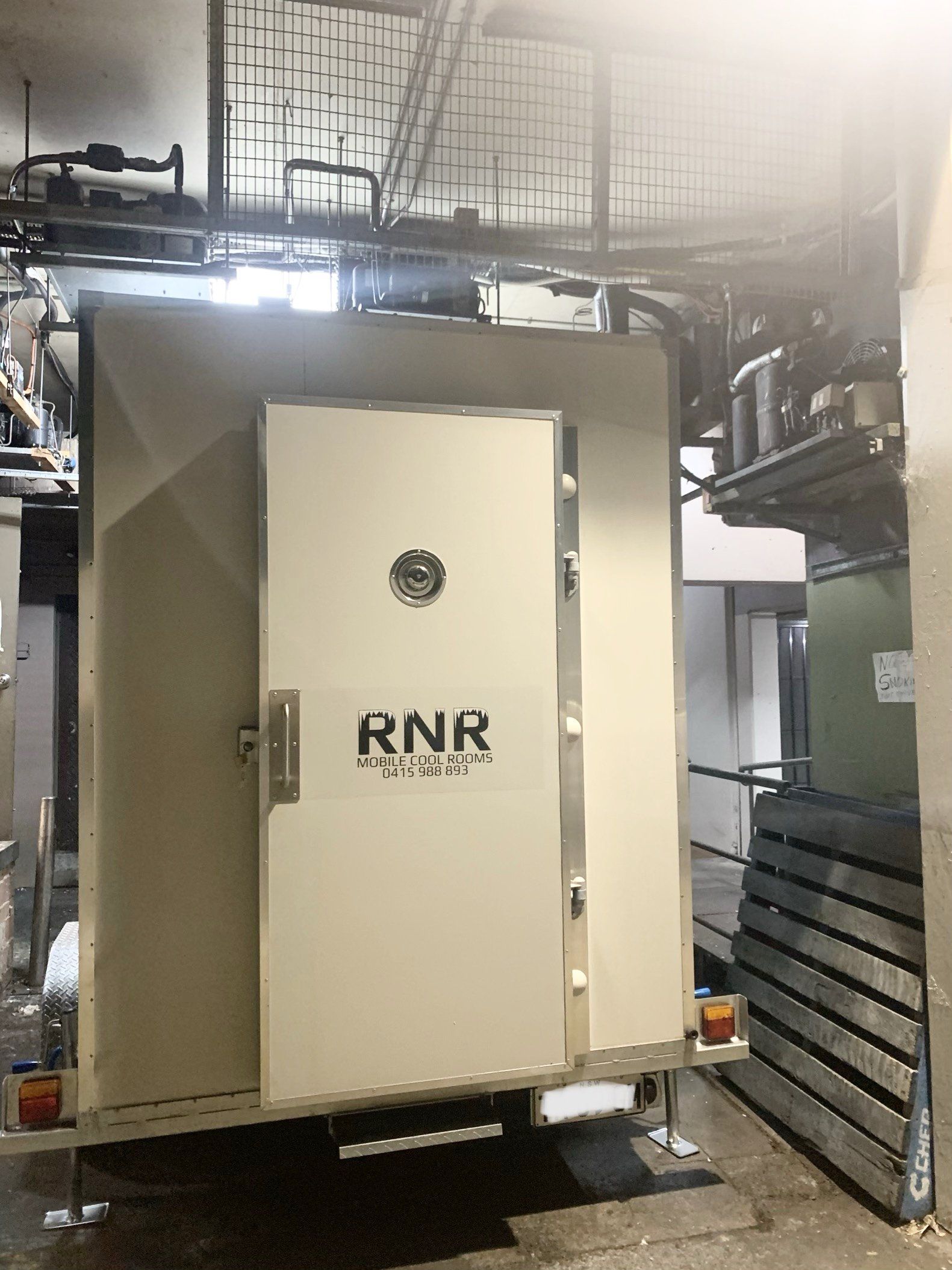 Mobile Cool Room Inside Garage — Auburn, NSW — RNR Mobile Cool Rooms