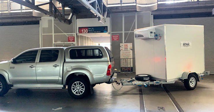Car Pulling the Mobile Cool Room — Auburn, NSW — RNR Mobile Cool Rooms