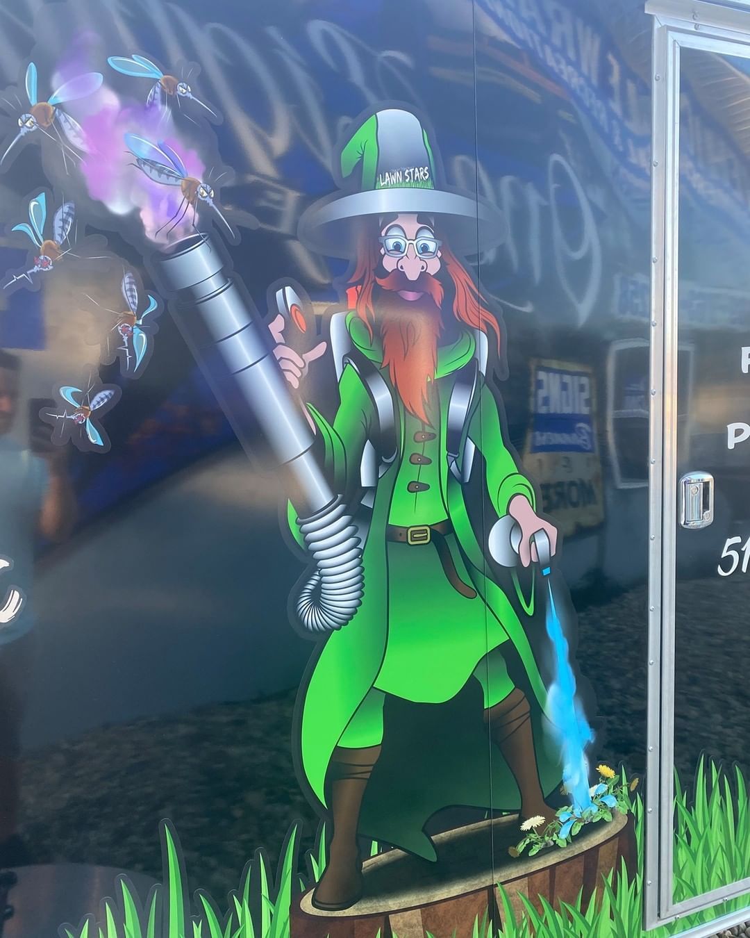 A cartoon of a leprechaun in a green coat holding a microphone