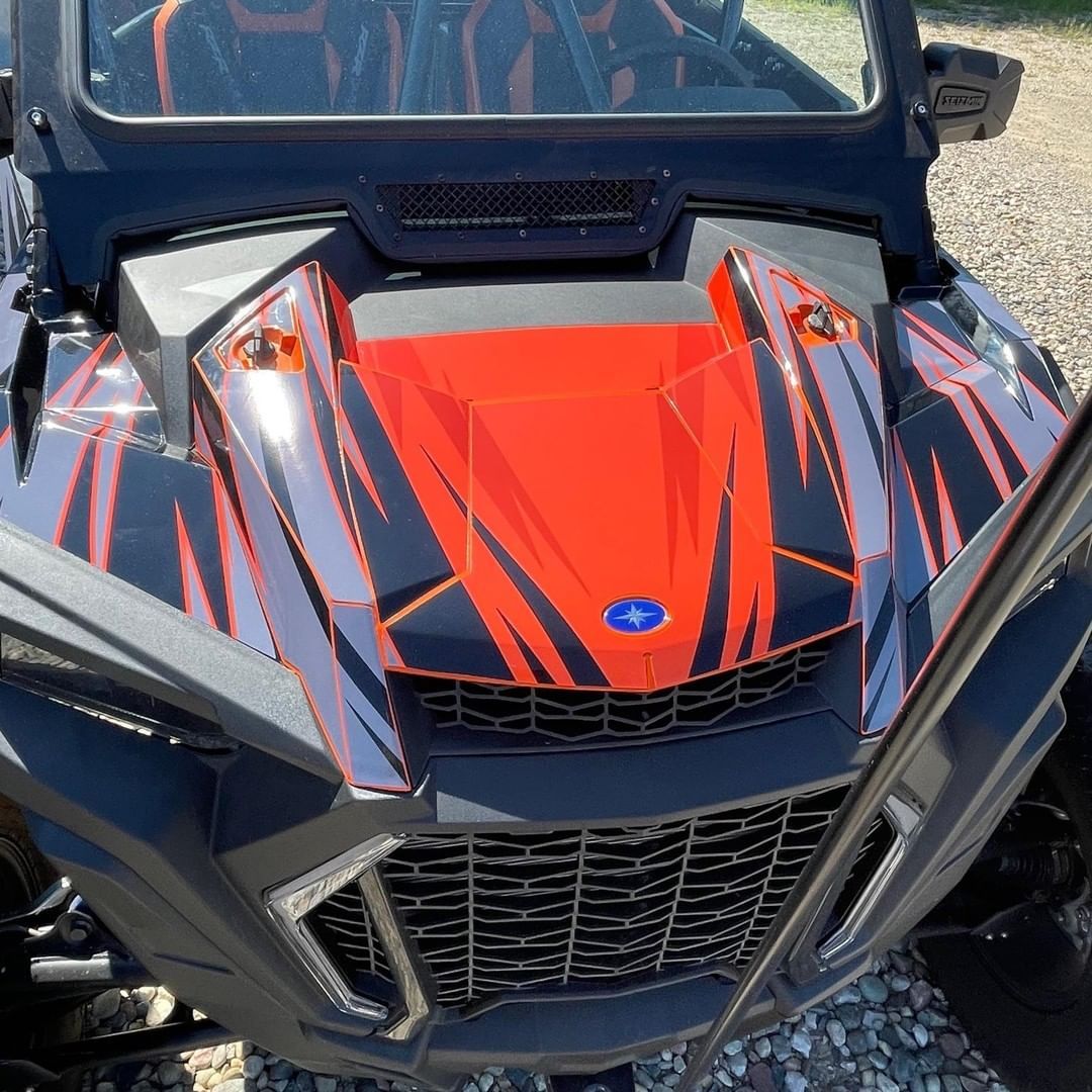 The front of a polaris rzr 1000 with the hood open