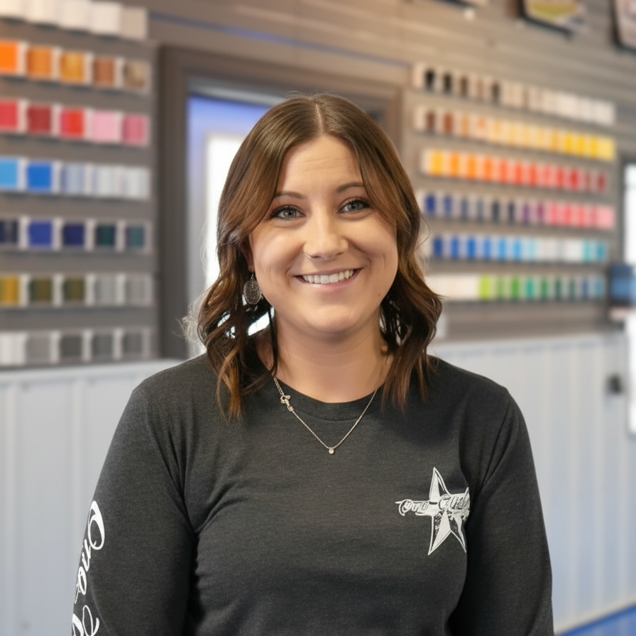 A woman wearing a black shirt with a star on it
