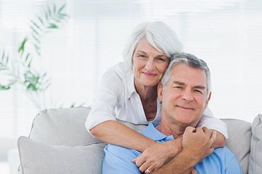 Man and Woman Smiling - Healthcare Services Keyword in West Newton, PA