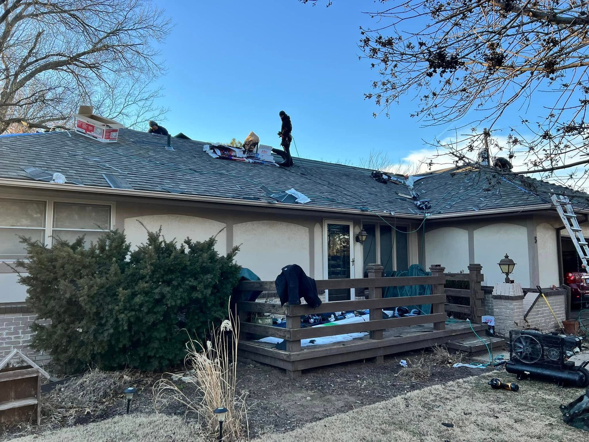 A house with a roof that is being repaired.