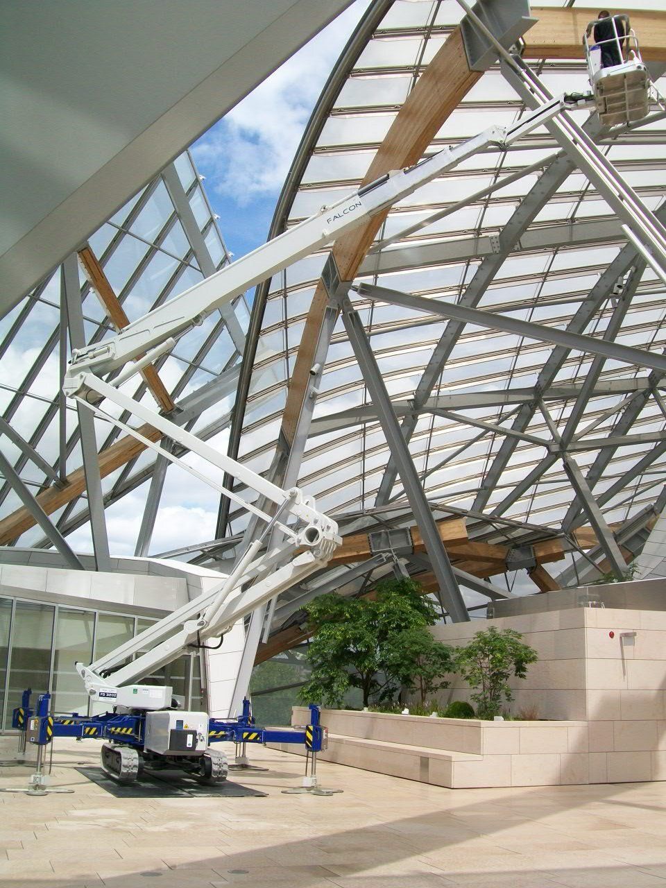 A crane is being used to lift a large building