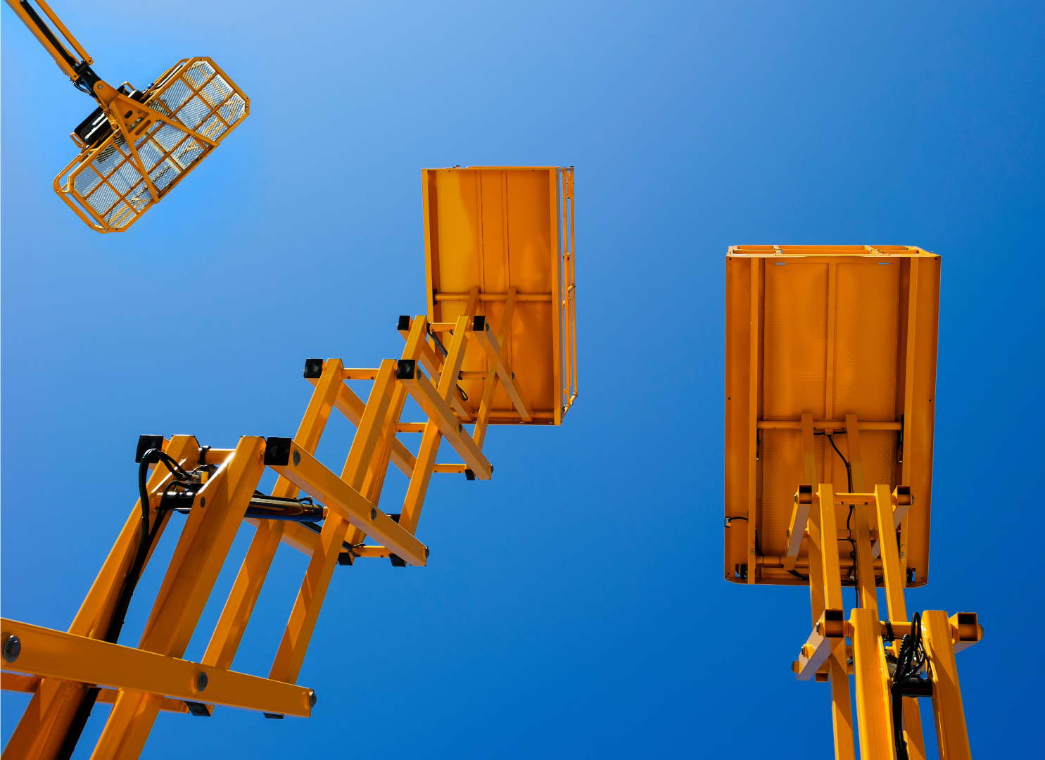 Yellow fleet of telescopic & articulating boom lifts, telehandlers, and crawler booms, available for wholesale re-rental
