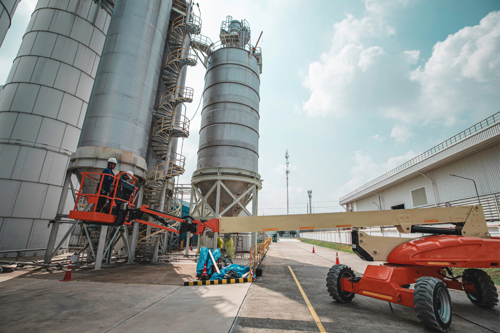 JLG 1500AJP articulating boom lift, 150 ft on a job site
