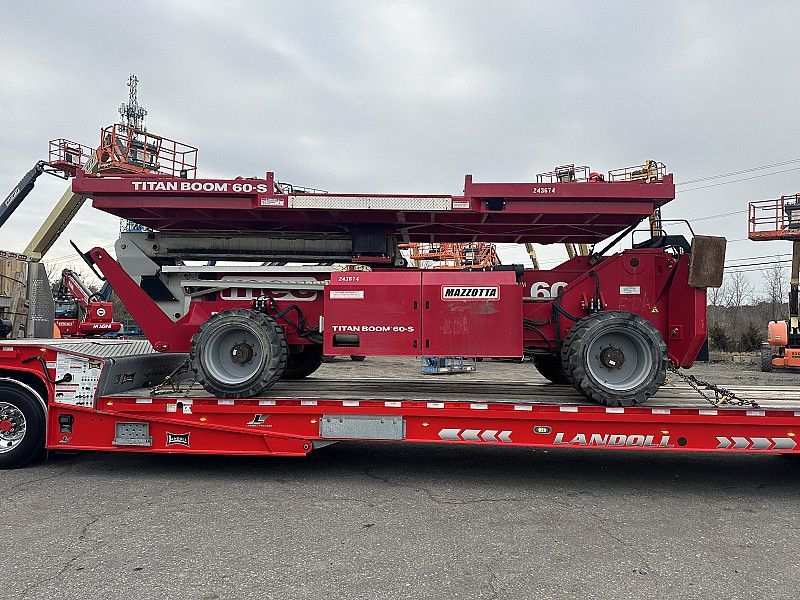 MEC Titan 60-S red specialty boom lift for construction, heavy material handling, and high-reach work