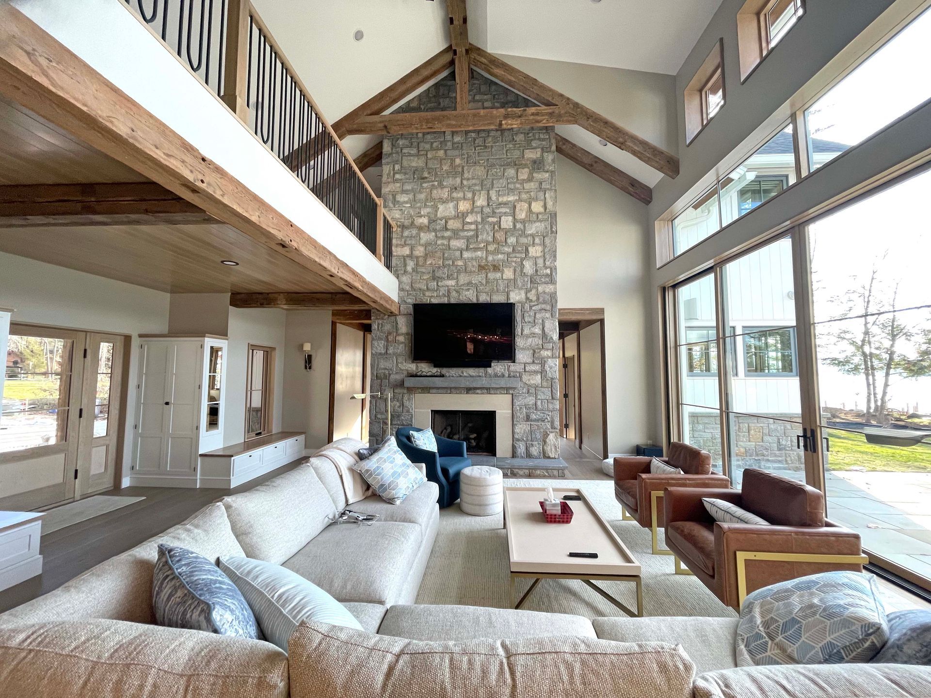 A living room filled with furniture and a fireplace.