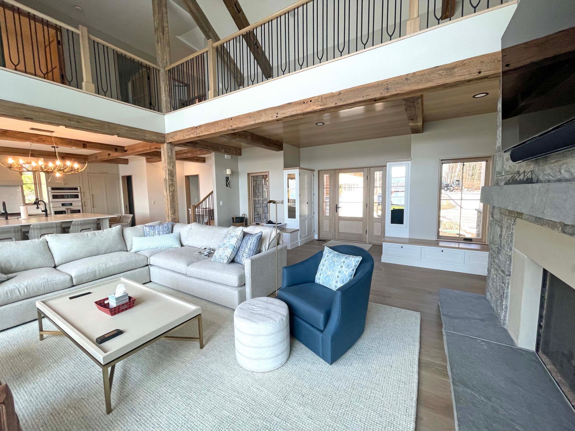 A living room filled with furniture and a fireplace.