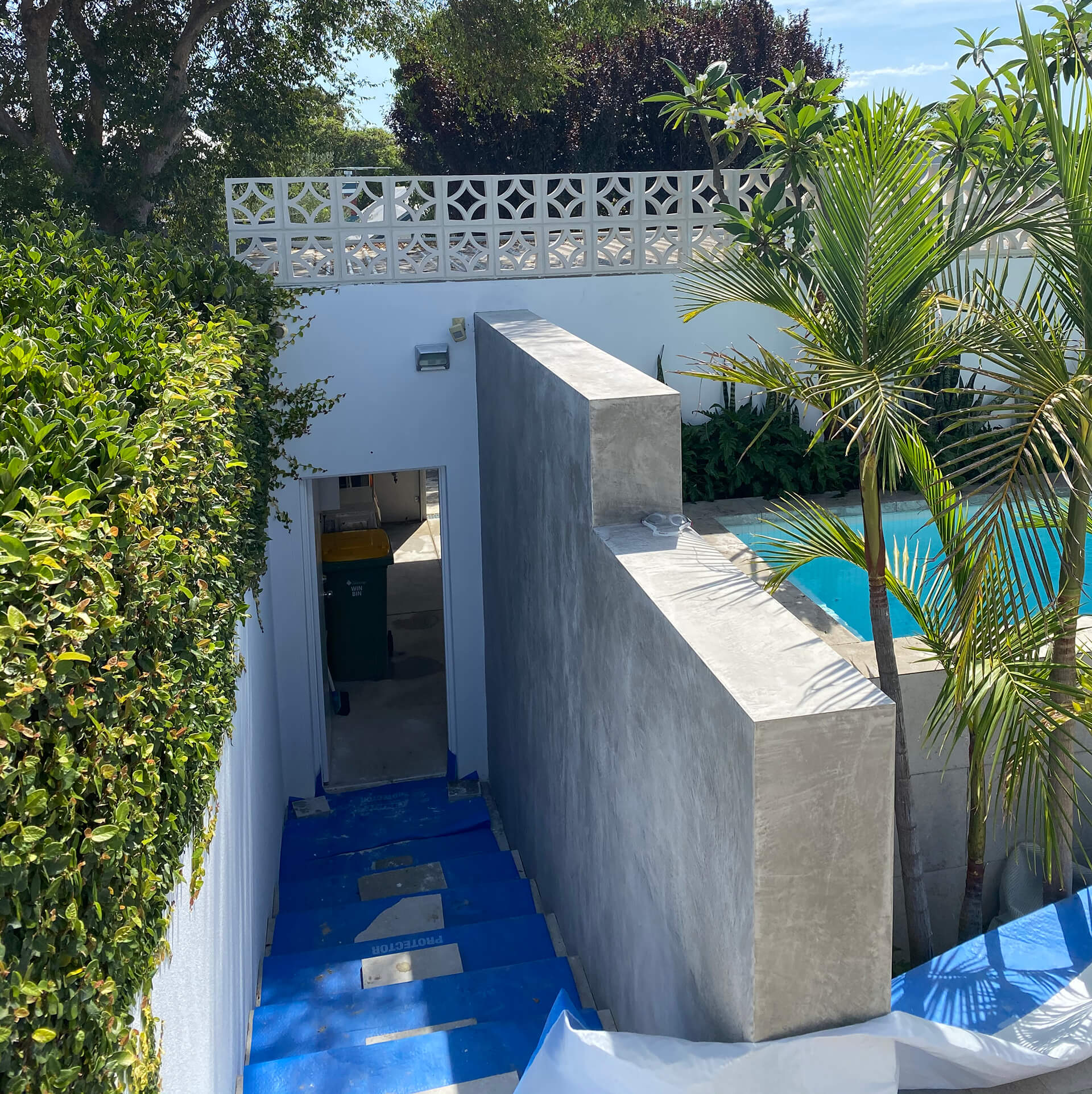 pool planter box brick wall idea