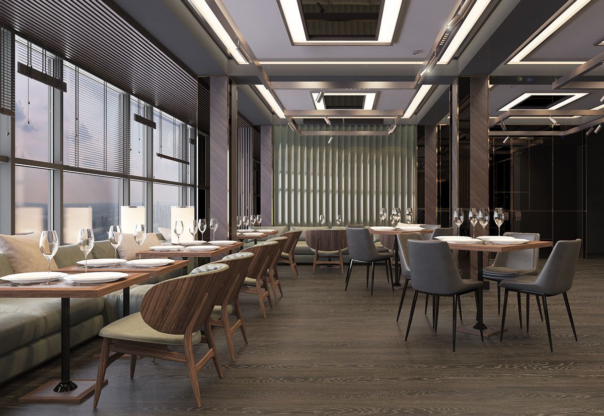 Glass windows reflect greenery from outside, with metal frame.