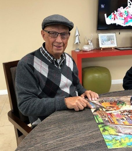 A Senior and a Caregiver Eating a Meal Together — Tustin, CA — Americana Senior Care
