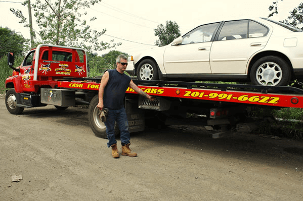 Towing The White Car — Kearny, NJ — Bibbs Auto Recycling