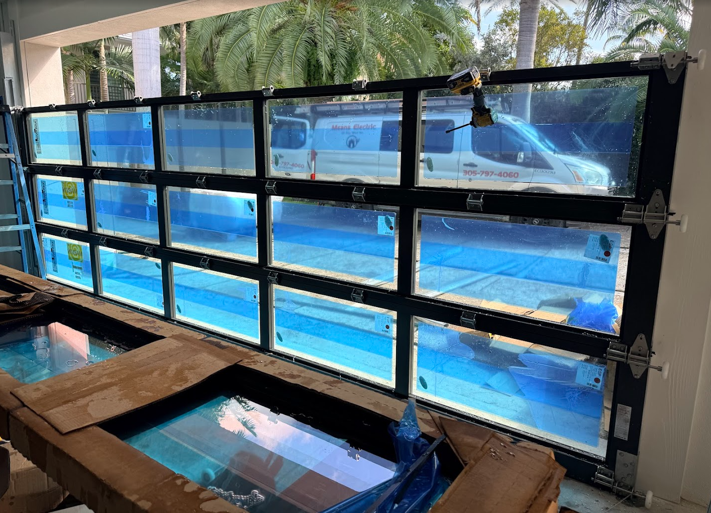 A building under construction with a sign that says warm