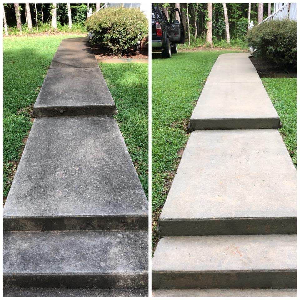 Before and after of a concrete walkway and steps, cleaned with a pressure washer.