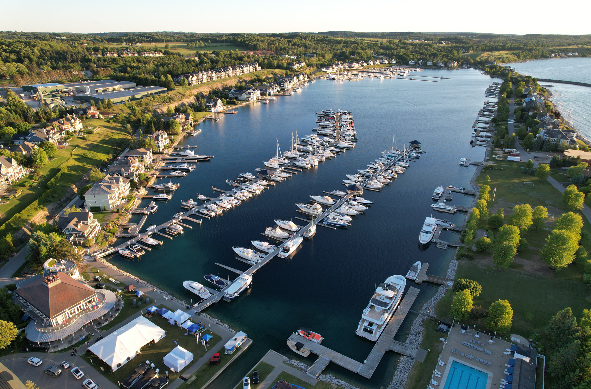 An aerial view of a marina with many boats docked