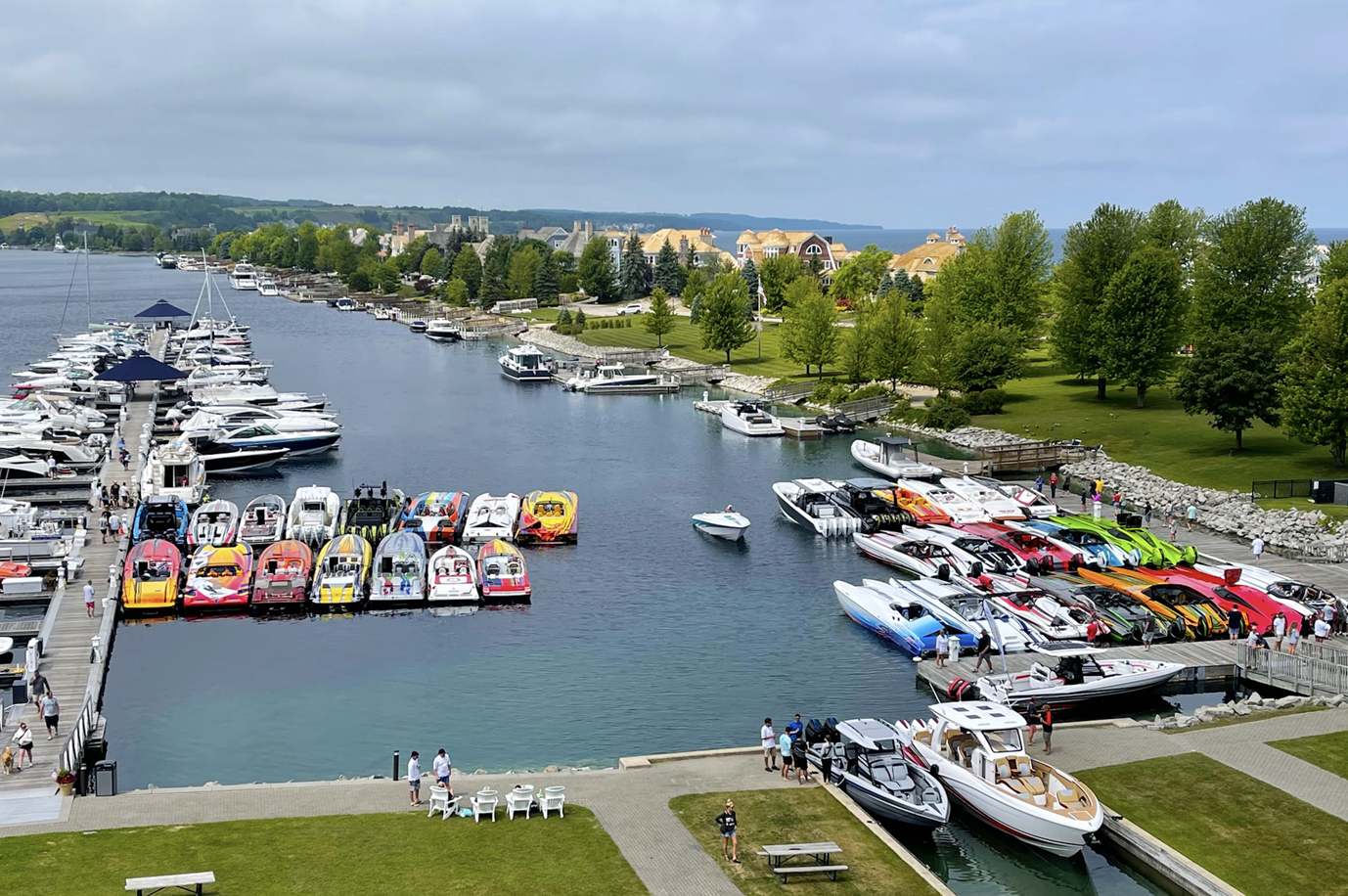 A bunch of boats are docked in a harbor