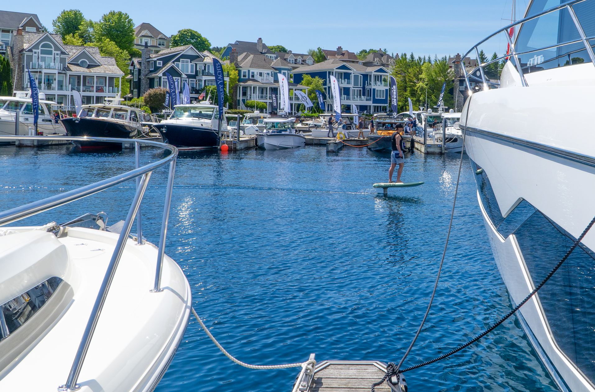 A boat is tied to a dock in a marina.