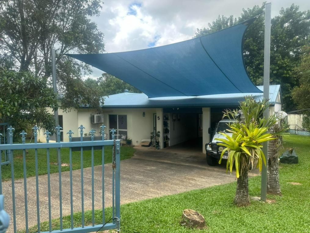 Blue Shade Sails In The Driveway Of The House — Cairns Vinyl & Canvas in Bungalow, QLD