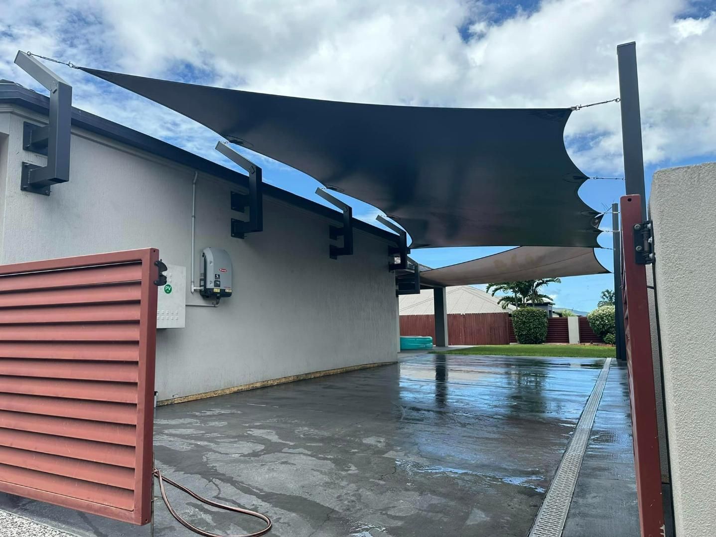 Shade Sails In The Driveway Of The House — Cairns Vinyl & Canvas in Bungalow, QLD