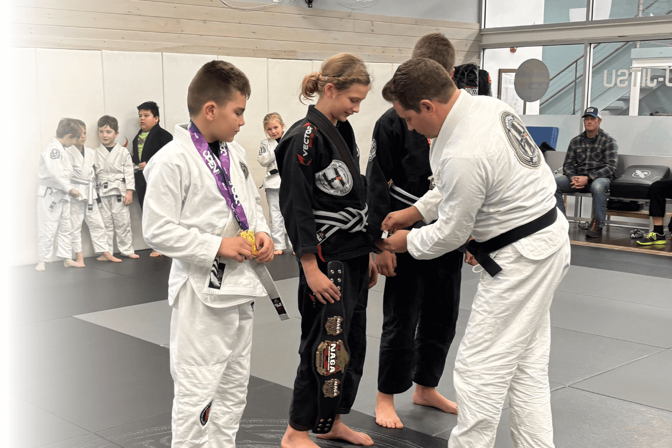 Kids practicing controlled grappling drills at Hamptons Jiu-Jitsu in Southampton, NY to build focus and discipline 