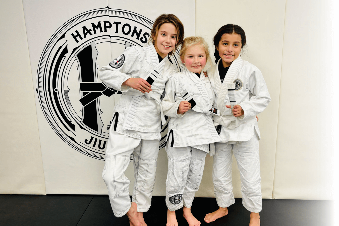 Kids practicing controlled grappling drills at Hamptons Jiu-Jitsu in Southampton, NY to build confidence and focus.