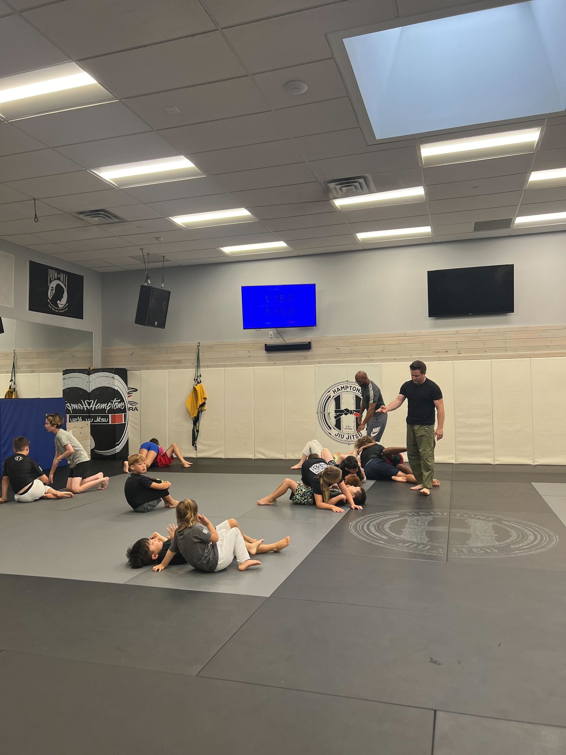 Beginner Brazilian Jiu-Jitsu students learning techniques at Hamptons Jiu-Jitsu in East Hampton NY