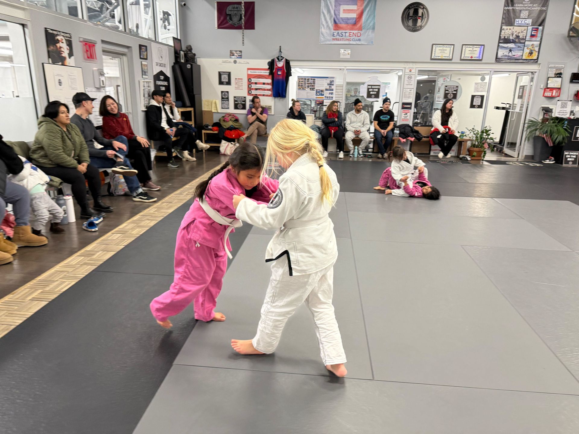 Students drilling brazilian jiu jitsu escapes at Hamptons Jiu-Jitsu in Southampton, NY for safer sel