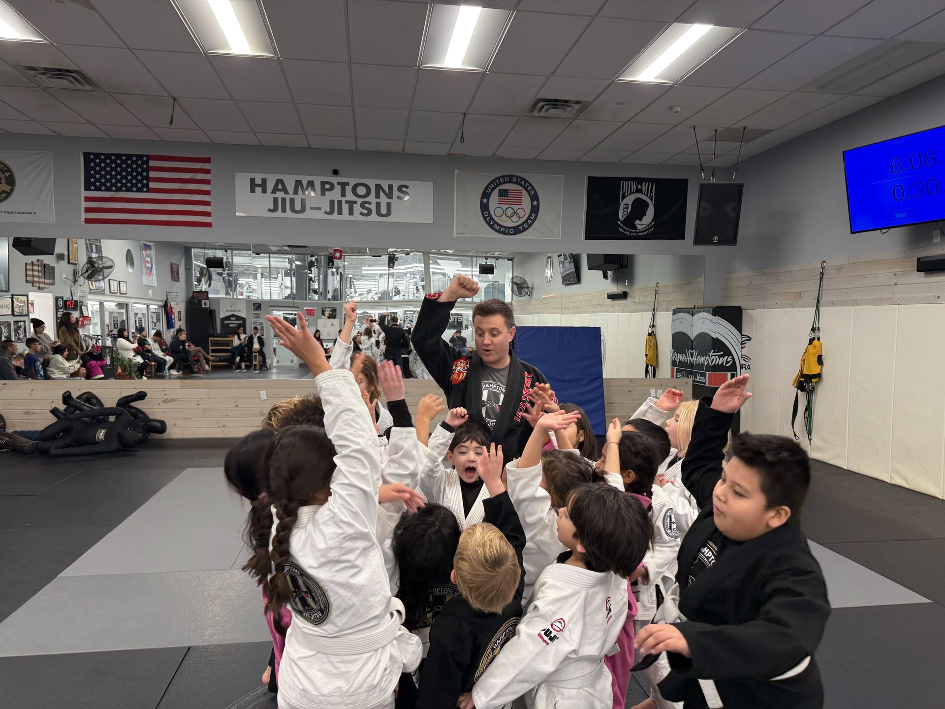 Students at Hamptons Jiu-Jitsu in Southampton NY staying motivated during long-term BJJ training.