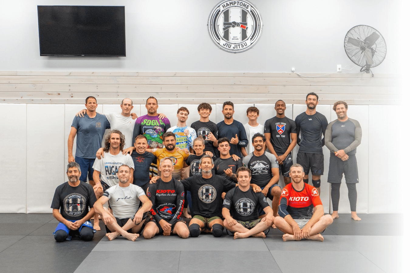 Adults drilling jiu jitsu techniques at Hamptons Jiu-Jitsu in Southampton, NY for fitness and confidence.