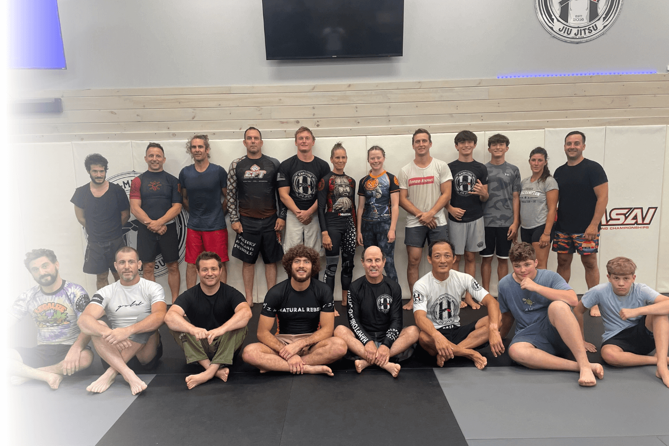 # How Jiu Jitsu in Southampton Inspires Healthy Habits for Busy Adults
## A few hours on the mats each week can quietly reorganize your sleep, stress, and energy - without adding another complicated “plan” to your calendar.
Busy adults in Southampton usually do not need another lecture about health. You already know what you should do: move more, eat better, sleep longer, stress less. The hard part is consistency, especially when work, family, and social commitments stack up fast. That is where jiu jitsu fits in a surprisingly practical way.
We see it all the time: when you train jiu jitsu, you do not just “work out.” You start building a routine that makes other healthy choices easier. People show up for the skill, the community, and the challenge, and somewhere along the way, better habits begin to stick.
## Why jiu jitsu works when traditional fitness plans fail
Most fitness programs rely on willpower and vague goals. Jiu jitsu gives you something more specific: a craft to learn. Each class has a purpose, a beginning and an end, and immediate feedback. You either improve your timing, position, and escapes, or you do not. That clarity matters when your schedule is packed and your attention is split.
There is also an enjoyment factor that is easy to underestimate. Research on martial arts style activities has highlighted that “exercise you enjoy” is more likely to become a sustainable behavior. In other words, if you actually like what you are doing, you are far more likely to keep doing it. We structure training so you can feel progress early, which helps you stay consistent even during busy weeks.
From a health standpoint, consistent training can support cardio-respiratory improvement and stress regulation. Studies on active training groups in grappling style programs have shown reductions in blood pressure and pulse rate over time. We never promise medical outcomes, but we do see that regular training often pairs with calmer baseline stress and better day-to-day energy.
## The Southampton lifestyle challenge: high demand, low time
Southampton is full of high performers. That can mean long hours, high responsibility, lots of driving, and a calendar that gets booked out weeks ahead. The wellness culture here is strong, but time is the real bottleneck. You might have motivation, and still feel like you cannot fit fitness into your life without sacrificing something else.
Jiu jitsu Southampton training solves that problem in a realistic way because it is time efficient. You can train a few times per week and still get meaningful benefits, because each session combines strength, conditioning, mobility, coordination, and mental engagement. It is not a separate cardio day, a separate strength day, and a separate “stress management” day. It is all in one room.
We also recognize that adults need flexibility. Your best routine is the one you can repeat, not the one that looks perfect on paper. That is why our class schedule is designed for real life, including people who can only commit to certain days or who need a predictable rhythm to stay consistent.
## The habit loop: how jiu jitsu creates momentum
Healthy habits tend to form through a loop: cue, routine, reward. Jiu jitsu naturally provides all three.
Your cue might be as simple as leaving work and driving to class. The routine is the structured training session. The reward is immediate: you learned something, you handled a tough round, you got a little better. That reward is not abstract like “maybe I will be healthier next year.” It is right there, class by class.
Over time, that loop spills into daily life. When you train, you start to notice what affects your performance, and you begin adjusting without forcing it. People often clean up sleep because they want to feel sharp on the mats. They hydrate more because cramps are not fun. They stop skipping meals because rolling on an empty stomach feels terrible. It is practical, not preachy.
## What busy adults actually gain from consistent training
We focus on building skills, but the lifestyle benefits show up quickly when you train consistently. Here are a few of the most common “side effects” busy adults notice after starting jiu jitsu:
• Better sleep quality, because your body and nervous system finally get a clear signal to downshift at night
• More daily movement, including improved mobility and less “stuck at a desk” stiffness
• A stronger relationship with food, because you start fueling performance instead of chasing quick fixes
• Lower background stress, since training gives you a controlled place to practice pressure and recover from it
• More confidence in your body, not just how it looks, but what it can do in a real situation
• A clearer sense of progress, because your improvements are measurable in technique and timing
None of that requires perfection. It requires reps and a routine you can actually maintain.
## Brazilian jiu jitsu in Southampton: a skill first approach that keeps you coming back
One reason brazilian jiu jitsu in Southampton fits busy adults is that it stays interesting. There is always another layer to learn: escapes, guard retention, passing sequences, transitions, submissions, and the strategy that connects it all. That variety makes it easier to stay consistent than a repetitive gym routine.
We also keep training structured so you are not guessing what to do. A typical class includes technique instruction, drilling for repetition, and controlled live rounds where you apply what you learned. That structure is important for habit building because it reduces decision fatigue. You just show up, and we guide the process.
And yes, jiu jitsu is demanding, but it is scalable. You can train at an intensity that matches your current fitness, your age, and your recovery capacity. The goal is progress, not punishment.
## Managing stress the adult way: pressure, problem solving, and reset
Stress management advice often sounds nice but feels unrealistic. Breathe. Meditate. Take a walk. Those things can help, but many adults need something more physical, more grounding, and honestly more engaging.
Jiu jitsu gives you real pressure in a controlled environment. Someone is trying to pass your guard or control your posture, and you have to stay calm enough to solve the problem. That practice transfers. You start noticing that stressful moments at work do not spike you as hard, because you have trained your response: assess, breathe, act, adjust.
There is also the simple benefit of a hard reset. When you train, you are not scrolling, multitasking, or half-listening to a meeting. You are present. For busy adults, that can feel like a mental vacation that also happens to improve your fitness.
## Time efficiency: what “consistent” looks like for a packed schedule
A common fear is that you have to train every day for jiu jitsu to “work.” You do not. Consistency is about repeatability. For many adults, two to three classes per week is enough to build skill and see meaningful fitness benefits.
Here is a simple way we help students think about it:
1. Start with two classes per week for the first month to establish the routine  
2. Add a third class only when your recovery and schedule feel stable  
3. Protect one rest day after harder sessions so your body adapts instead of breaking down  
4. Use short mobility work at home to stay loose, especially hips, neck, and upper back  
5. Track attendance, not perfection, because showing up is the habit that drives everything else
That approach respects real life. It also keeps you training long term, which is where the real transformation happens.
## Injury prevention and longevity: training smart, not reckless
Any physical activity has risk, and grappling is no exception. The good news is that smart training culture reduces problems dramatically. We coach you to tap early, prioritize position, and build intensity gradually. Most preventable injuries come from ego, rushing, or skipping warm-ups, so we stay consistent with fundamentals and safety habits.
We also encourage recovery like adults, not like teenagers. Hydration, sleep, and basic mobility work go a long way. If something feels off, we would rather you scale down and keep training than push through and disappear for months. Longevity is a real goal, especially for busy adults who cannot afford downtime.
## Accountability that does not feel like pressure
Some people hate the idea of accountability because it feels like guilt. We do it differently. The room itself becomes your accountability. When you train with the same faces and you have a coach who remembers what you worked on last week, showing up becomes easier.
This is also why jiu jitsu can be more effective than solo workouts for habit building. If you are tired after work, it is easy to talk yourself out of the gym. It is harder to skip when you know you have training partners expecting you, and you know you will leave feeling better.
## Competition level coaching, everyday adult application
While many of our students train for health, confidence, and skill, we also bring a performance mindset into the room. Our academy has documented participation in IBJJF competitions, including team achievements, medal statistics, and top fighter results. That matters even if you never compete, because a competition tested approach tends to be organized, detail-oriented, and honest about what works.
It also aligns with broader trends: jiu jitsu continues to grow alongside the combat sports industry, and high-demand areas support premium coaching through private sessions and structured programs. In Southampton, that demand is real, and it is one reason we keep our instruction sharp and our curriculum intentional. You are busy, so your training time needs to count.
## Take the Next Step
If you want a routine that supports your health without turning into another stressful obligation, jiu jitsu is a strong answer for busy adults in Southampton. We keep training structured, scalable, and skill-focused so you can build momentum even when life is full.
When you are ready, we would love to meet you on the mats at Hamptons Jiu-Jitsu. Our goal is simple: help you train consistently, learn real skills, and leave class feeling like you did something meaningful for yourself.
Call to action 1: If you want to explore getting started, visit https://hamptonsjiujitsu.com/ and see how we set up new students for a smooth first class.  
Call to action 2: To find times that fit your work and family calendar, check the class schedule page at https://hamptonsjiujitsu.com/schedule.  
Call to action 3: If you are curious about our training philosophy and what to expect when you walk in, the about page is a good place to start at https://hamptonsjiujitsu.com/about.
Meta title: Jiu Jitsu in Southampton NY | Hamptons Jiu-Jitsu Healthy Habits  
Meta description: Build healthy routines with jiu jitsu in Southampton, NY. Train smarter, manage stress, and stay consistent at Hamptons Jiu-Jitsu.
Alternate titles:
1. Jiu Jitsu Southampton: The Busy Adult Guide to Building Better Habits  
2. How Brazilian Jiu Jitsu in Southampton Fits Real Life and Improves Health  
3. Jiu Jitsu for Busy Professionals in Southampton: Habits That Stick
IMAGE METADATA  
Image Title: Hamptons Jiu-Jitsu Jiu Jitsu in Southampton, NY  
Tags: martial arts, jiu jitsu, Southampton, New York  
Alt Text: Adults training jiu jitsu at Hamptons Jiu-Jitsu in Southampton, NY, building fitness and stress relief (110 characters)  
Geo Tag:  
Location Name: Southampton Village, Southampton  
Latitude: 40.8843  
Longitude: -72.3895
Suggestion:
Article 1
- Title: 7 Surprising Ways Adult Jiu Jitsu Boosts Health and Reduces Stress
- URL: https://www.hamptonsjiujitsu.com/7-surprising-ways-adult-jiu-jitsu-boosts-health-and-reduces-stress
- Key Topics: adult BJJ health benefits, stress reduction, mobility and flexibility, safe progressive training, consistency for busy adults
Article 2
- Title: 10 Reasons Adults Are Choosing BJJ for Fitness
- URL: https://www.hamptonsjiujitsu.com/10-reasons-adults-are-choosing-bjj-for-fitness
- Key Topics: fitness for adults, stress relief, confidence/self-defense, mental resilience, community and accountability
Article 3
- Title: Why Jiu Jitsu Is Becoming the Favorite Workout in Southampton
- URL: https://www.hamptonsjiujitsu.com/why-jiu-jitsu-is-becoming-the-favorite-workout-in-southampton
- Key Topics: jiu jitsu vs gym workouts, time-efficient training, focus and mental reset, Southampton lifestyle fit, adult fitness motivation
Article 4
- Title: How Jiu Jitsu Builds Confidence and Community in Southampton
- URL: https://www.hamptonsjiujitsu.com/how-jiu-jitsu-builds-confidence-and-community-in-southampton
- Key Topics: confidence building, community and belonging, stress relief, adult beginner-friendly training, staying consistent
Article 5
- Title: Starting Jiu-Jitsu - Tips for Beginners
- URL: https://hamptonsjiujitsu.com/starting-jiu-jitsu
- Key Topics: what to expect as a beginner, building a sustainable routine, gym etiquette and culture, getting started safely, consistency basics