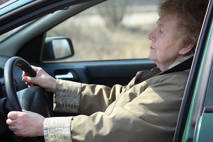 Elderly Woman Driving — Oklahoma City, OK — Freeman Collision Center