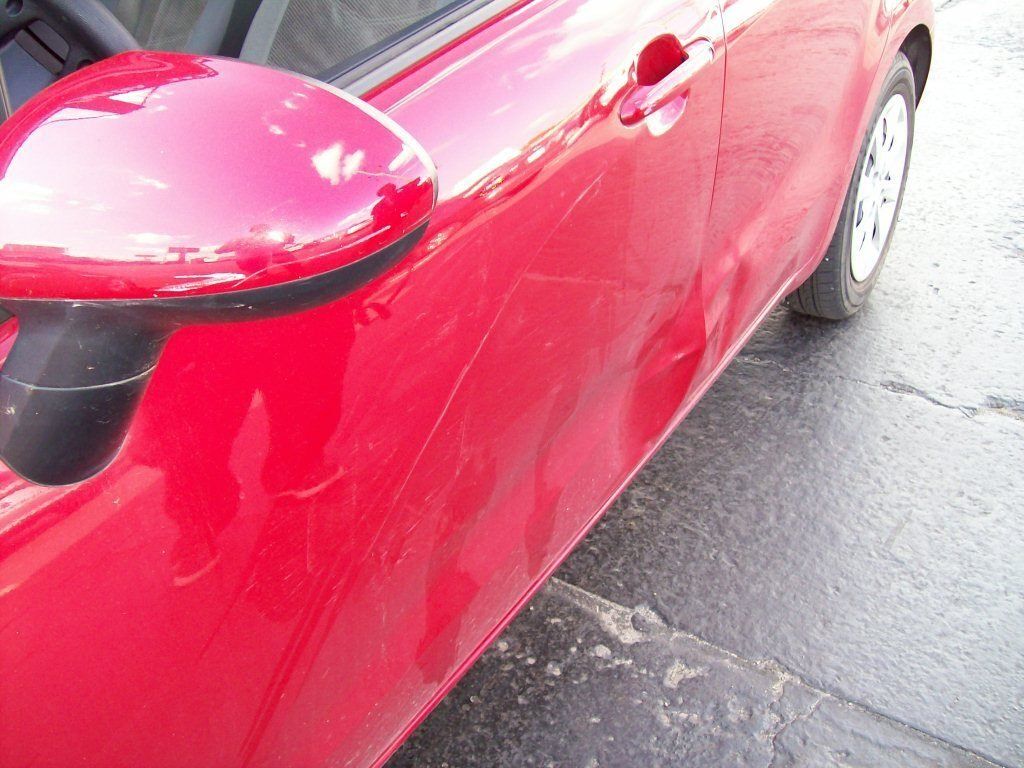 Kia Red Car Before — Oklahoma City, OK — Freeman Collision Center