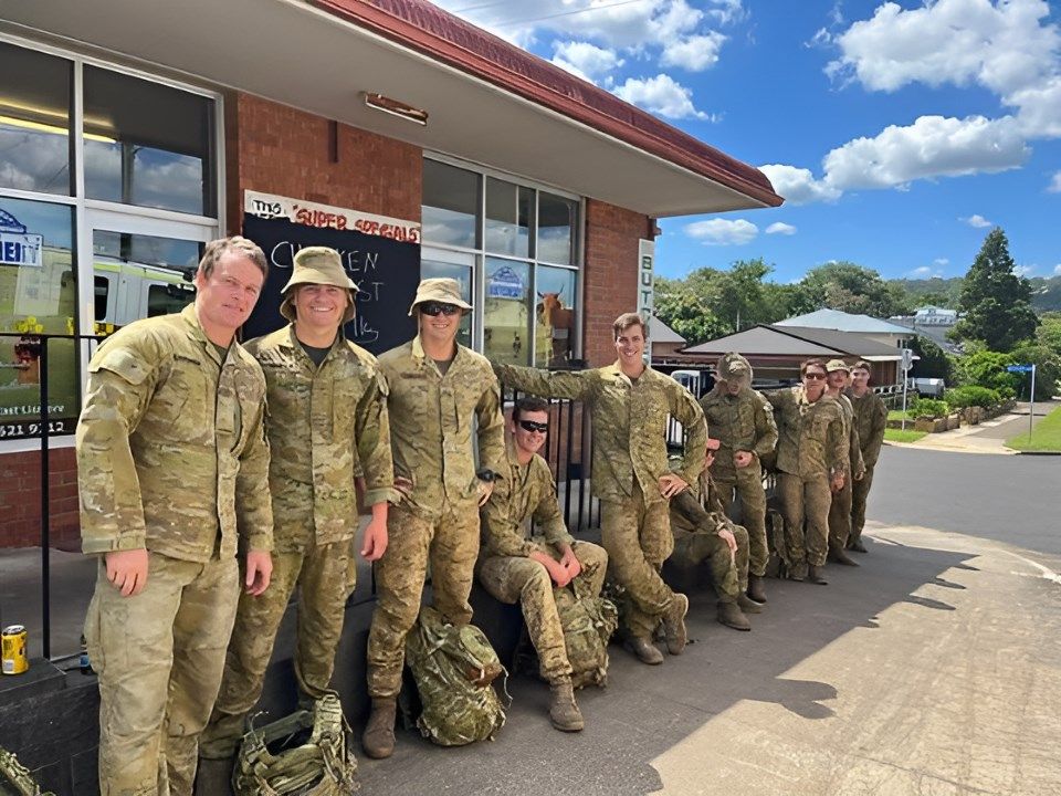 A Group of Soldiers Are Posing for a Picture in Front of a Building — Lismore Pie Cart in Lismore, NSW