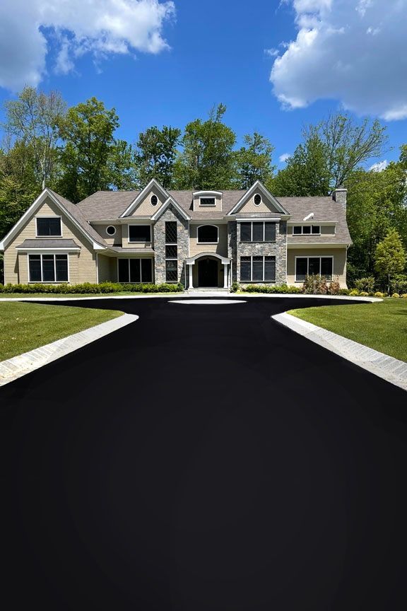 A white house with purple shutters and a garage