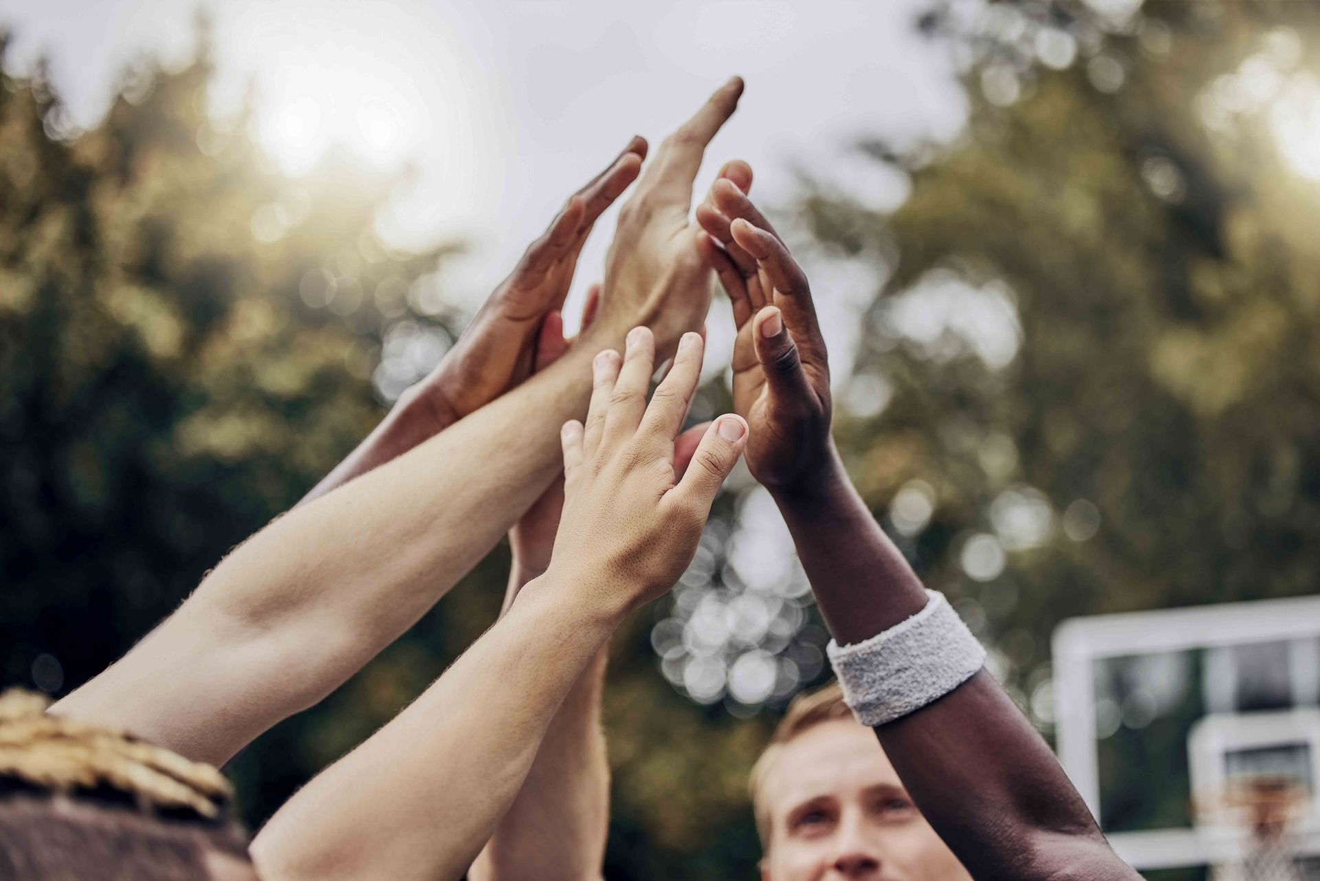 Four people wearing blue 