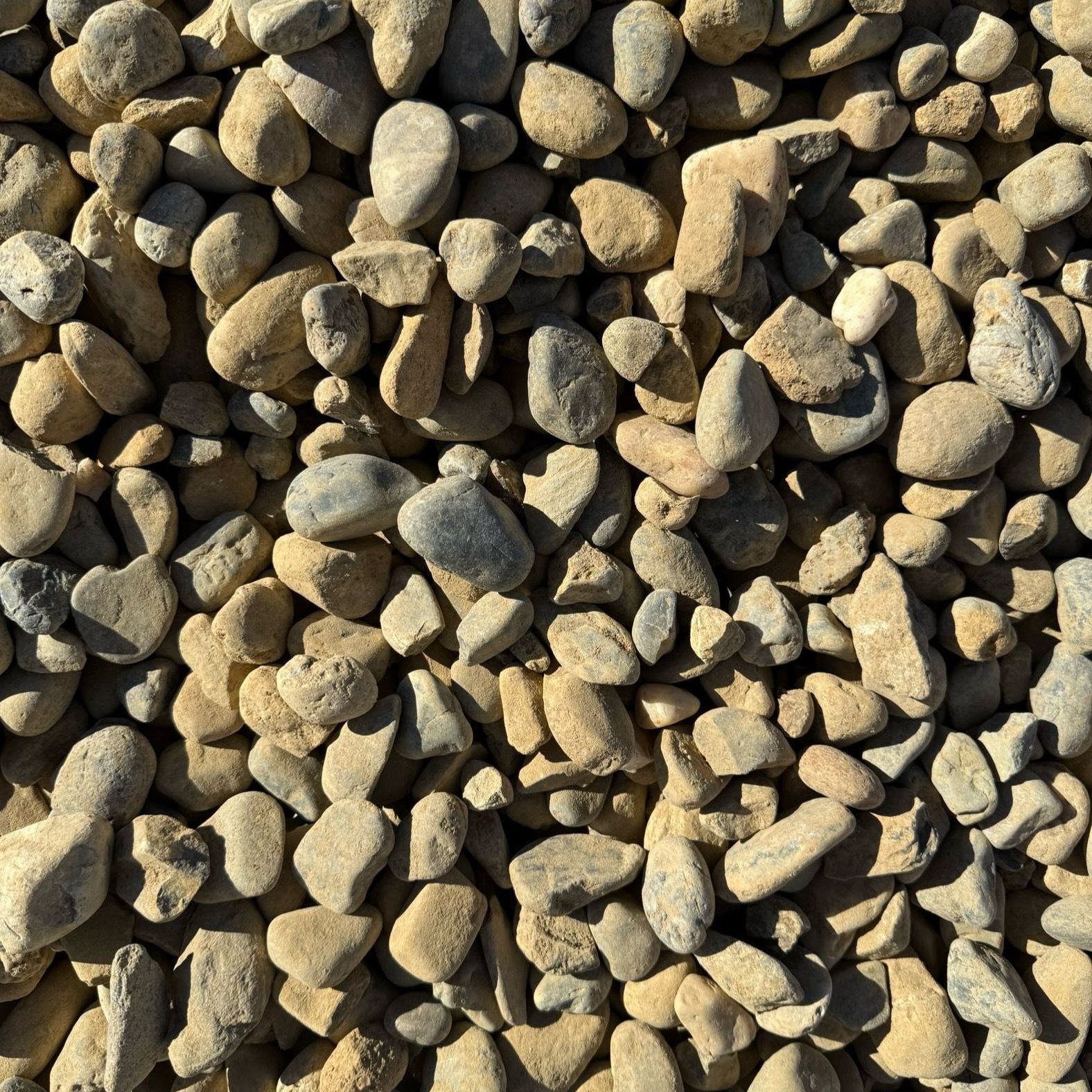 A pile of rocks is sitting on the ground