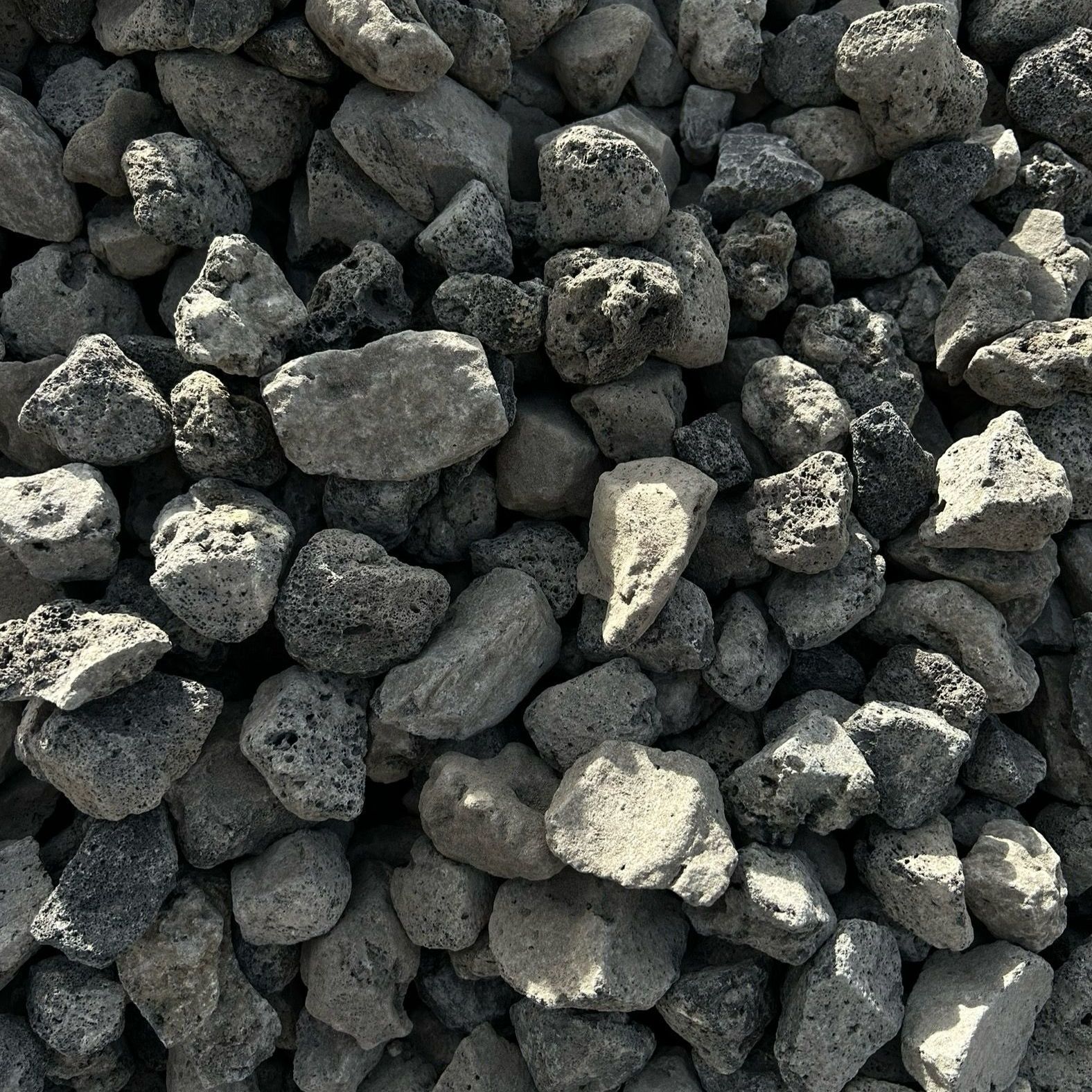 A pile of rocks is sitting on the ground