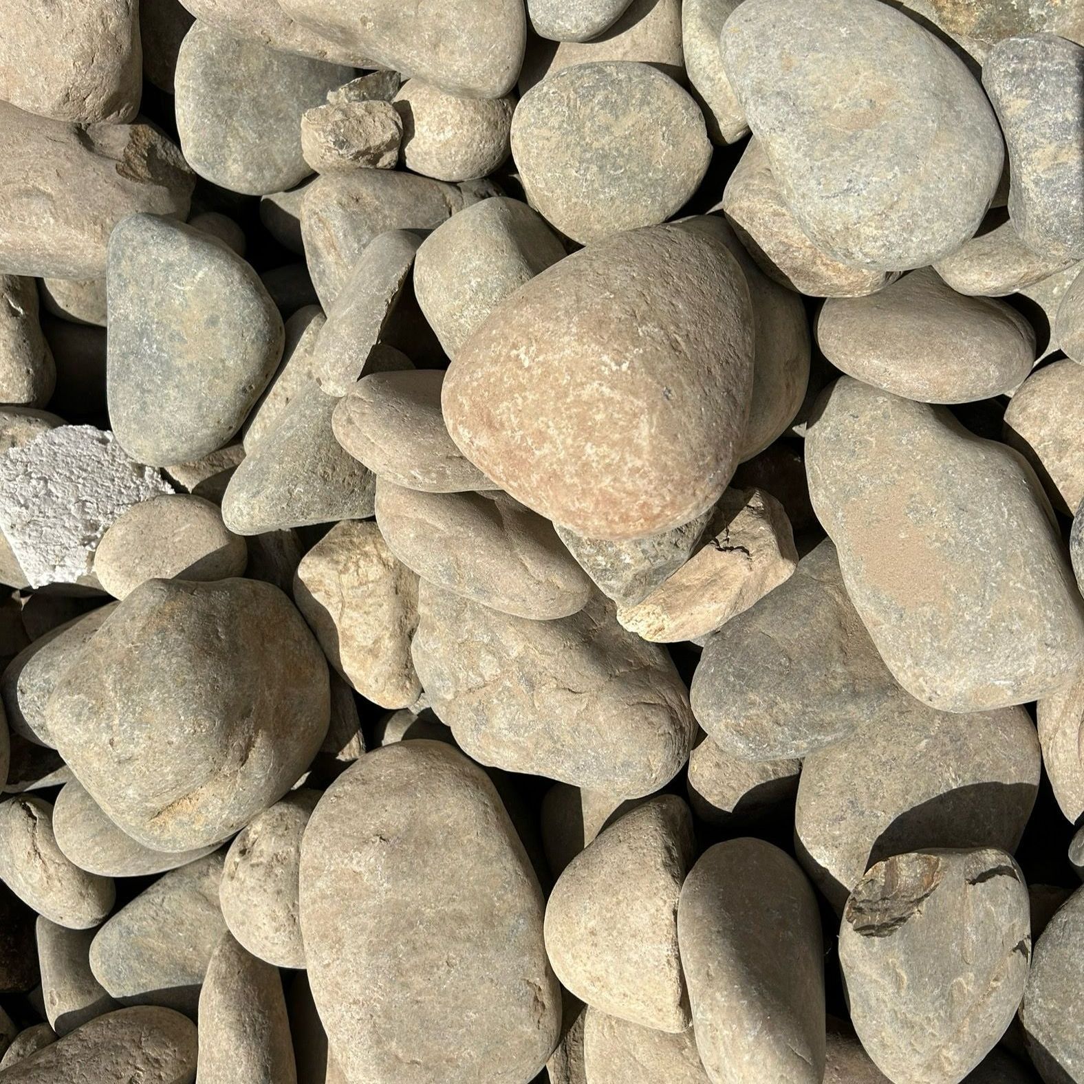 A pile of rocks is sitting on top of each other.