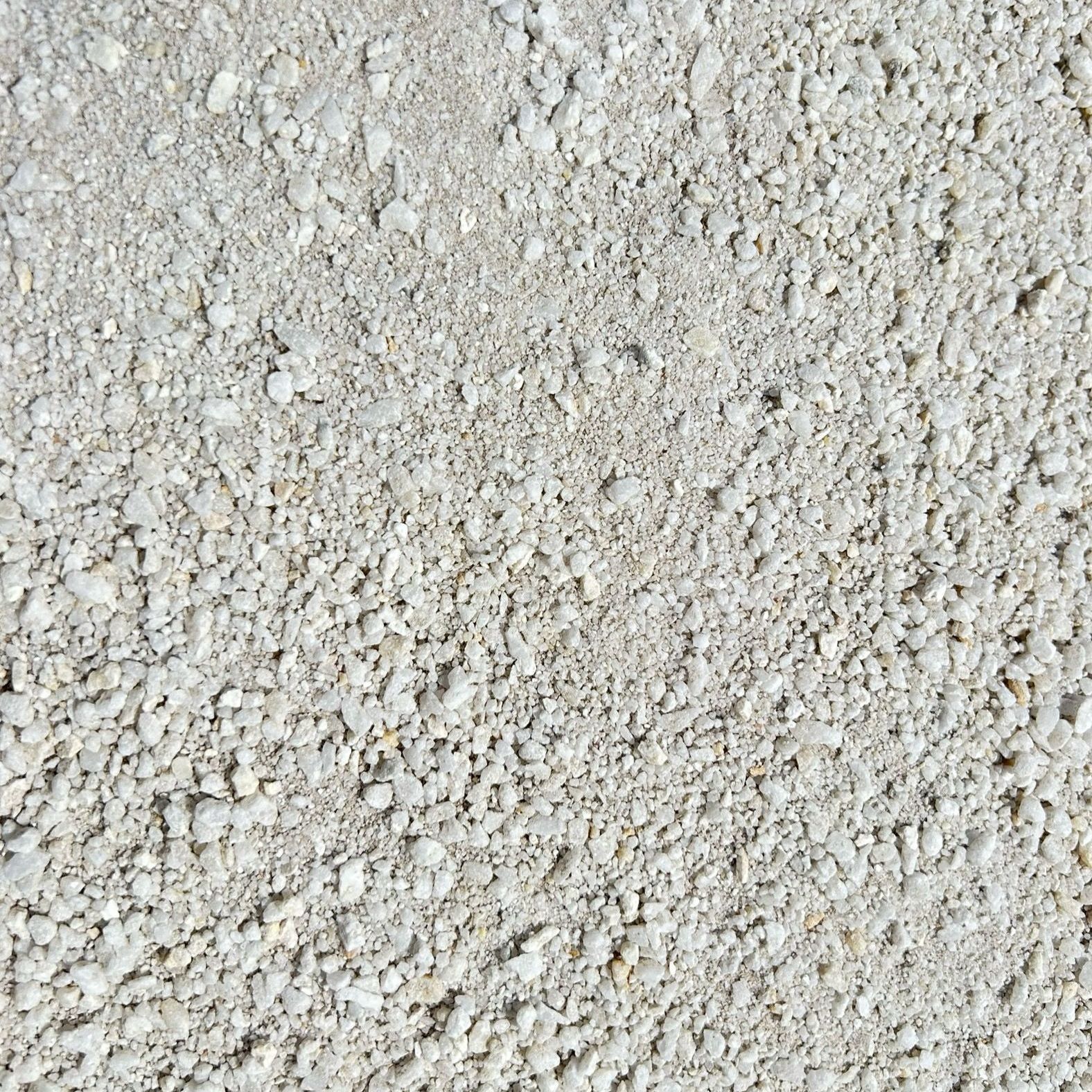 A close up of a pile of white gravel.