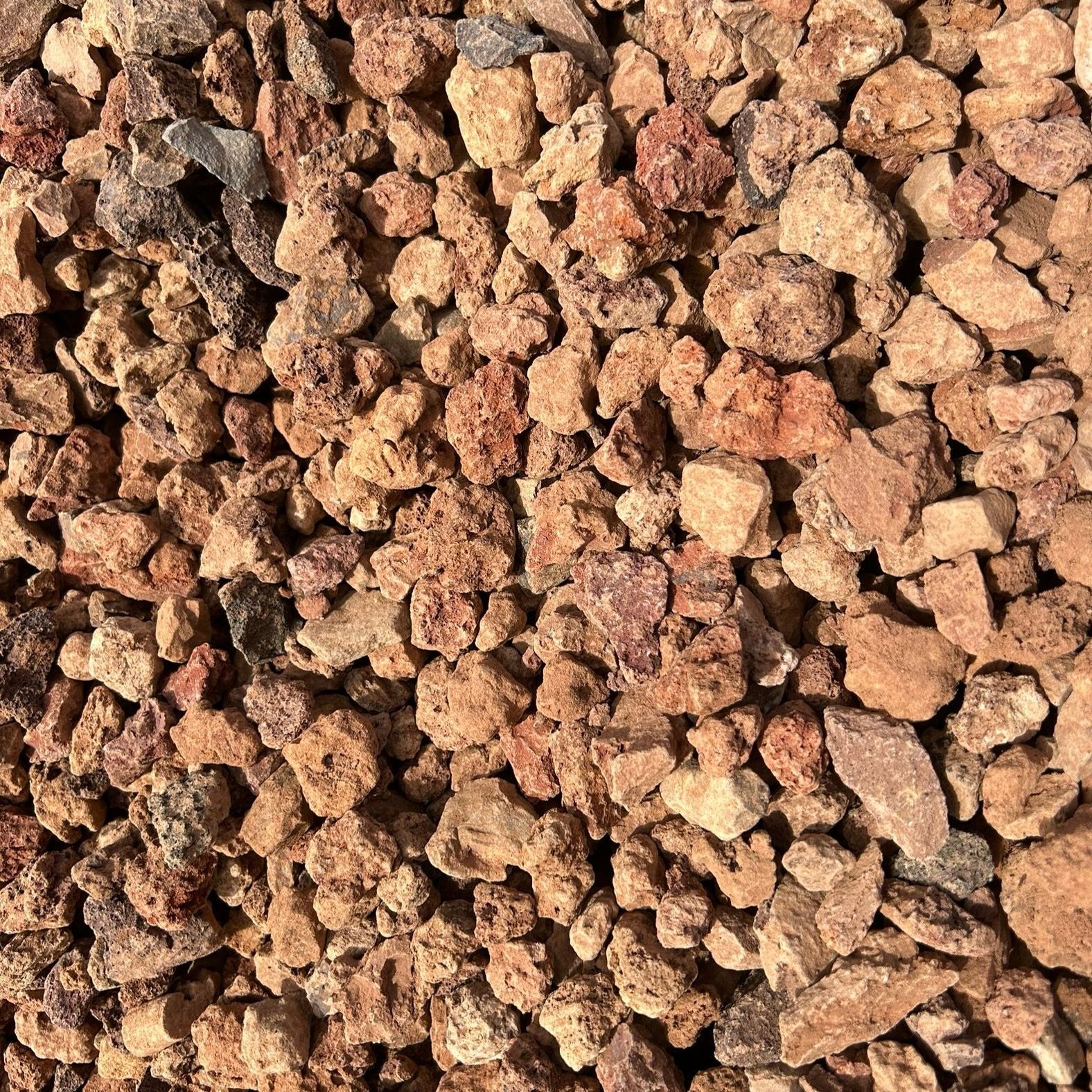 A pile of brown rocks sitting on top of each other on a table.