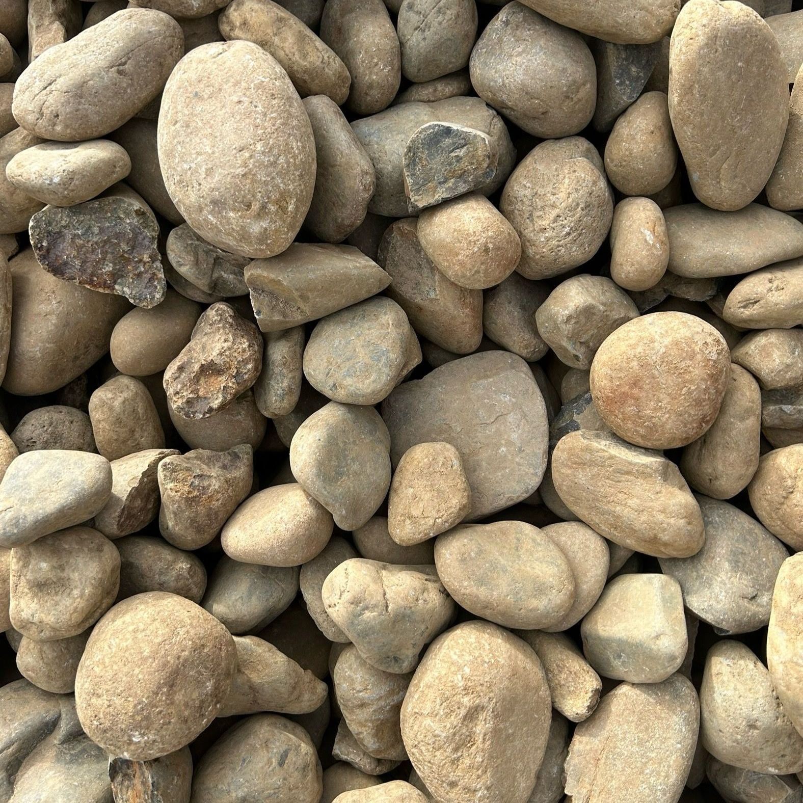 A pile of rocks is sitting on the ground