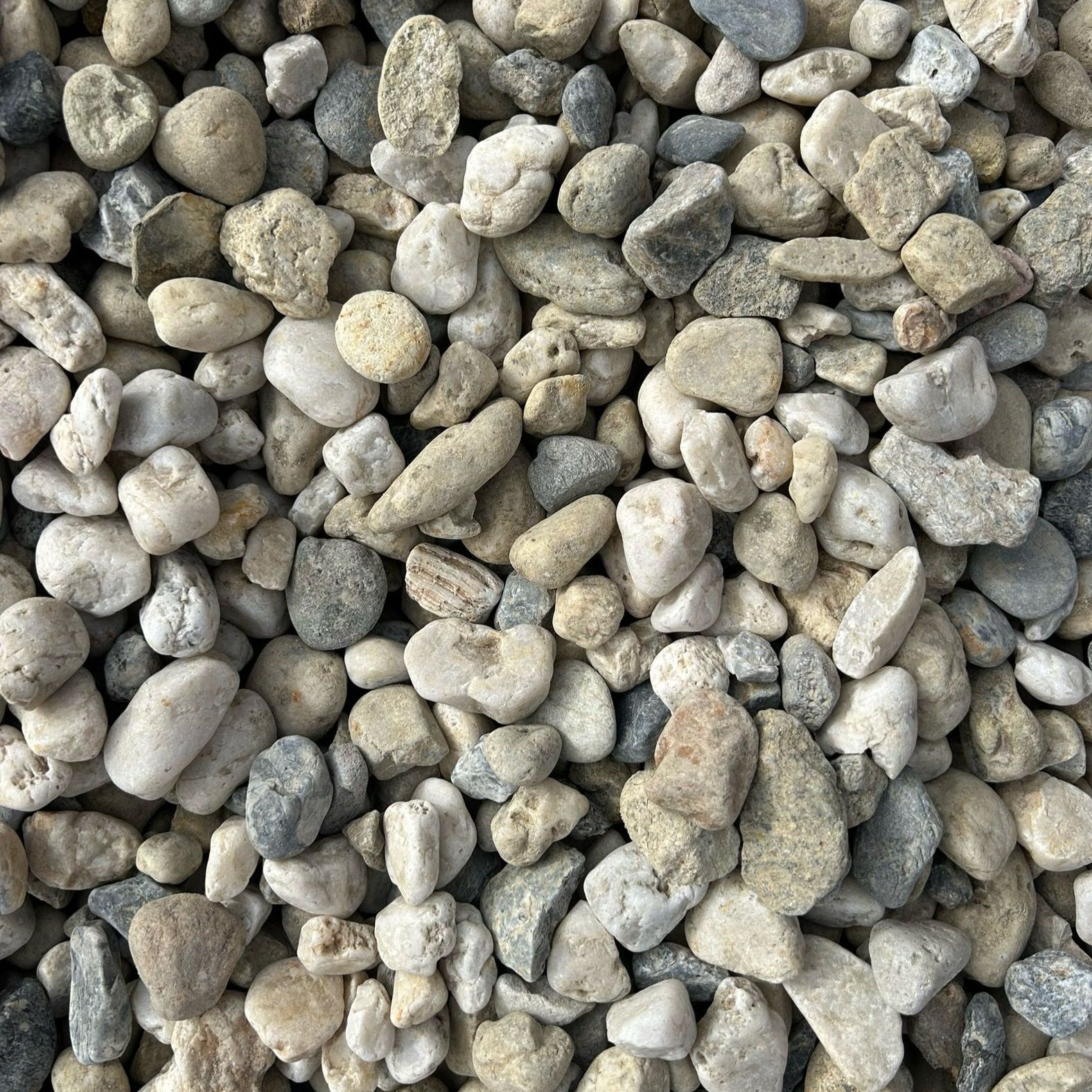 A pile of rocks of different sizes and colors