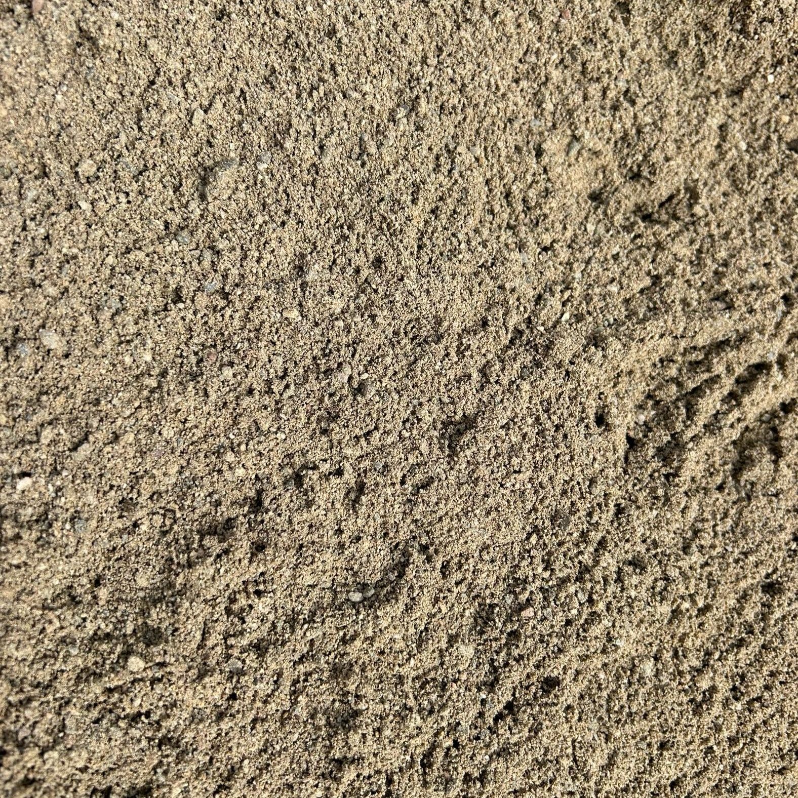 A close up of a pile of sand.