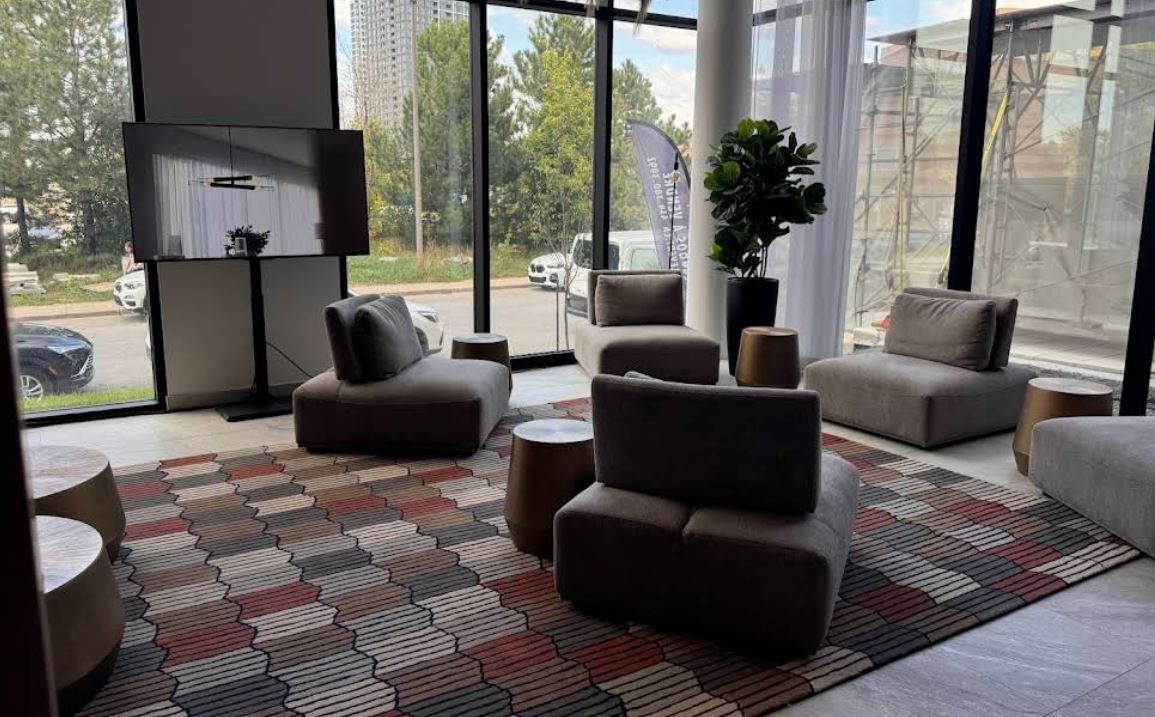 A living room filled with furniture and a television.