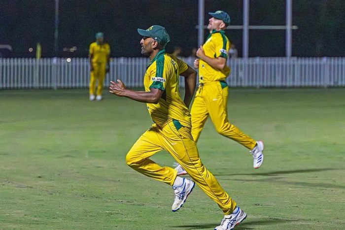 Lanson Partners team posing for a picture while sitting at a table
